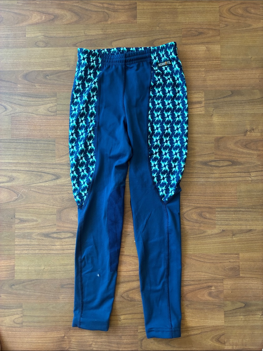 Kerrits Navy Riding Tights with Teal Geometric Side Panels